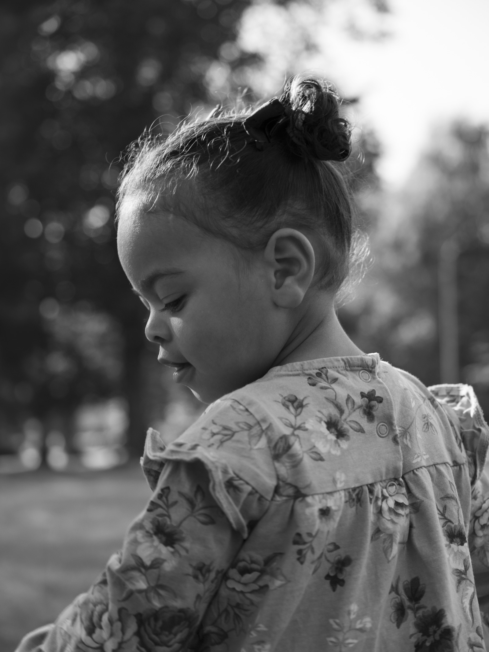 Black-and-white profile portrait of a child