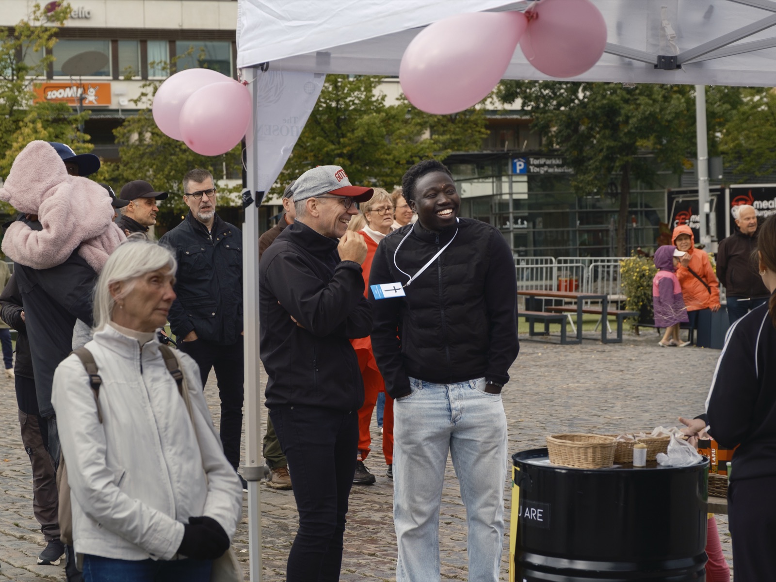 Visitors laughing together at the Vaasa Live community event