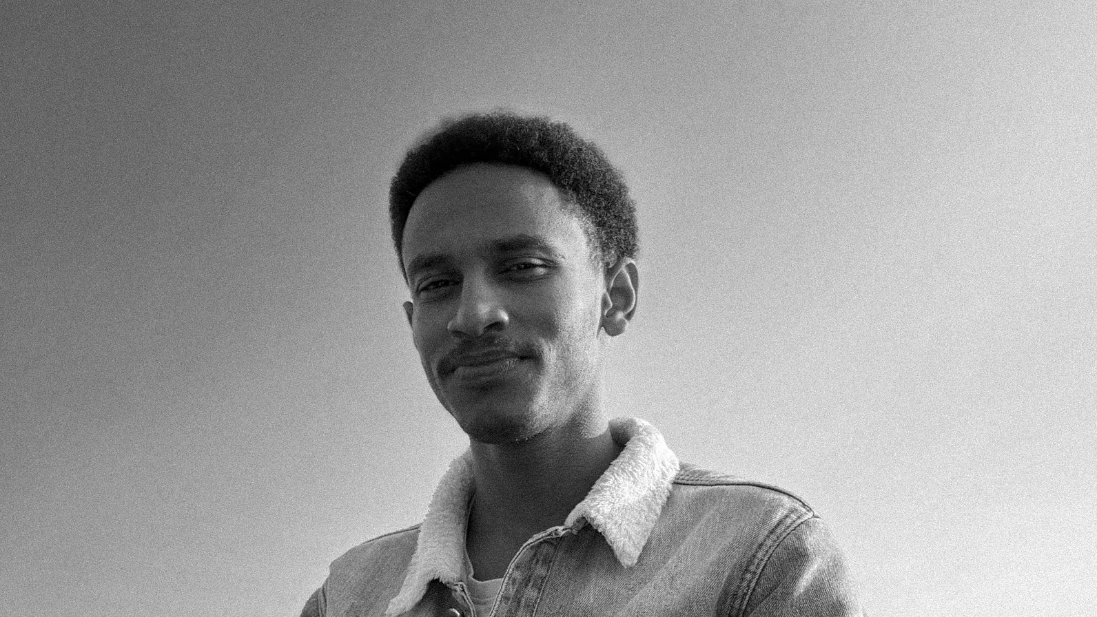 Black-and-white portrait of Shaun Abay